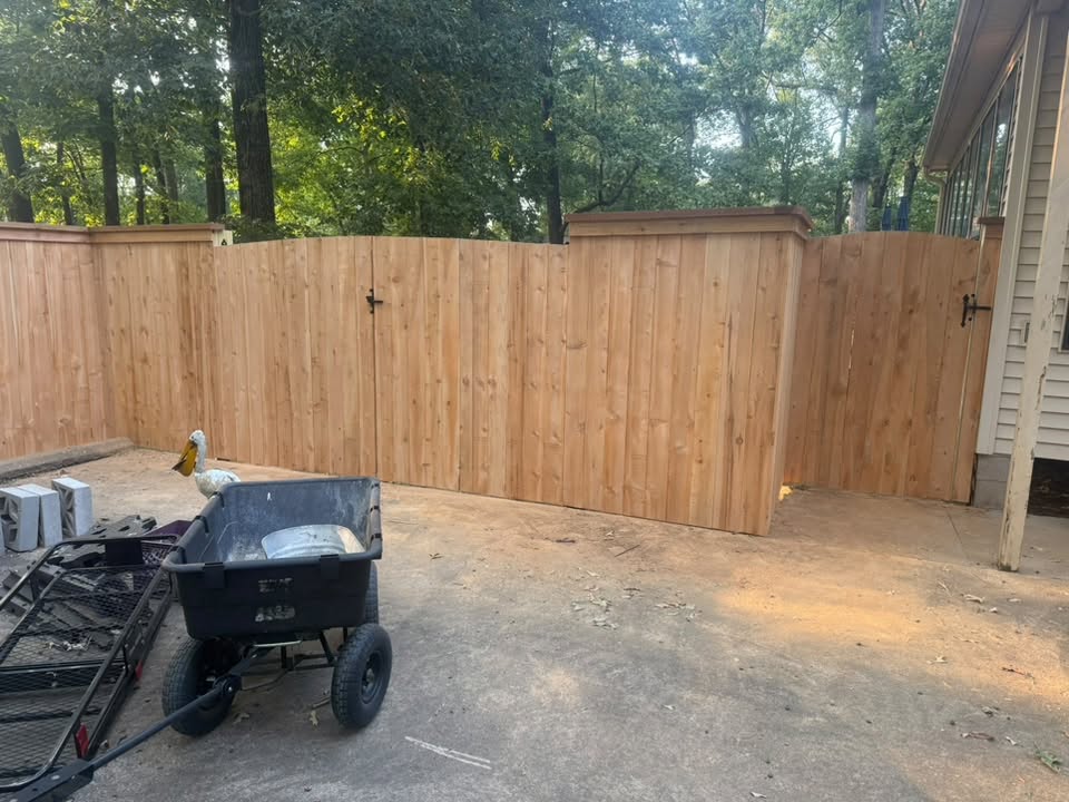 New wood privacy fence with gate built by Integrity Fence and Outdoor